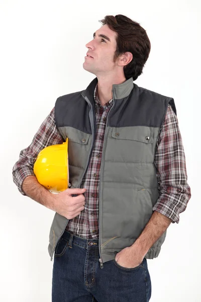 Construction worker staring off into space — Stock Photo, Image