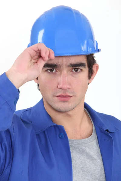 Um trabalhador da construção saudando . — Fotografia de Stock