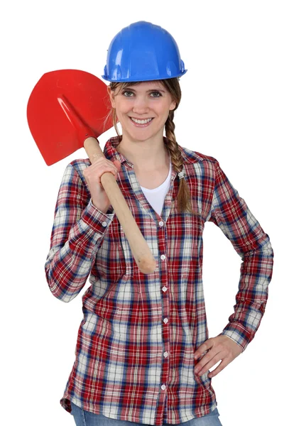 Kvinna med en spade — Stockfoto