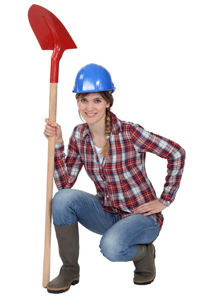 Woman holding spade — Stock Photo, Image