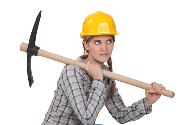 Female laborer with pickaxe on white background — Stock Photo, Image