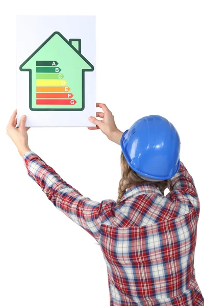 Woman holding an energy-saving drawing from backwards — Stock Photo, Image
