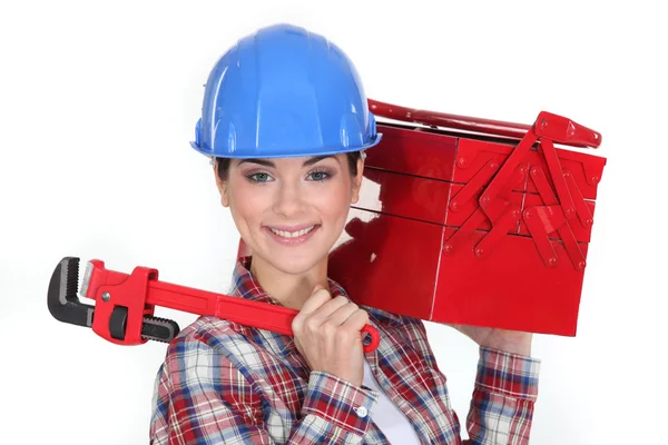 Счастливая женщина с ящиком для инструментов — стоковое фото