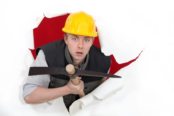 Workman with a pickaxe — Stock Photo, Image