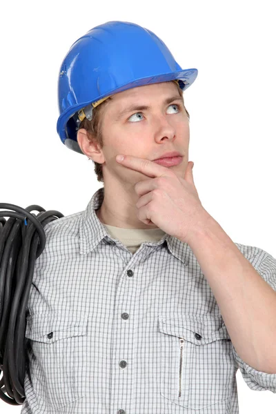 Thoughtful electrician — Stock Photo, Image