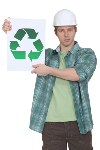 一名建筑工人推广废物回收再造. — 图库照片
