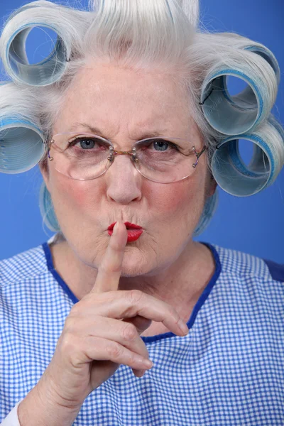 Woman with curlers for silence — Stock Photo, Image
