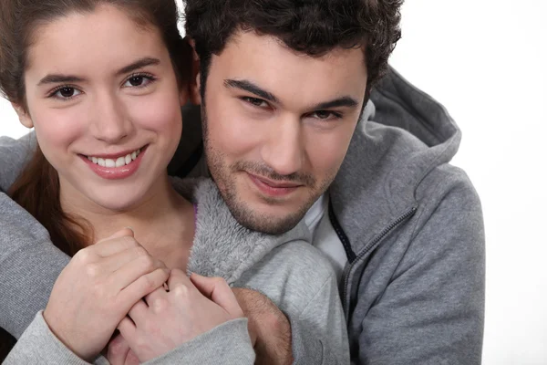 Young couple hugging — Stock Photo, Image