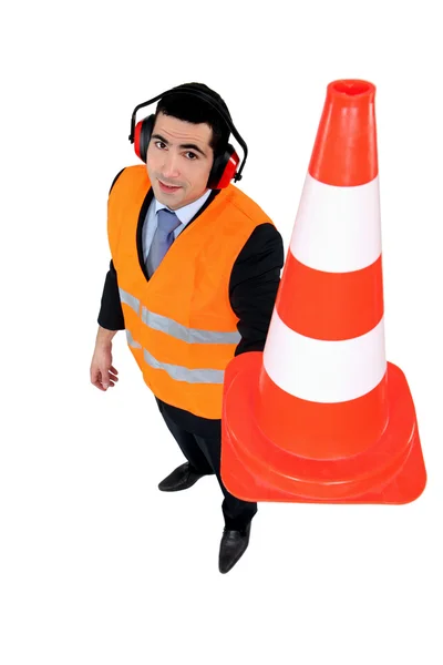 Homem com um cone — Fotografia de Stock