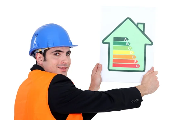 Man holding energy rating card — Stock Photo, Image