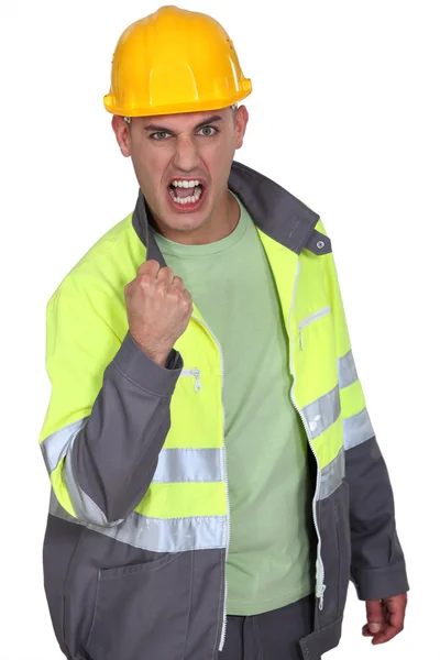 Aggressive construction worker rejoicing — Stock Photo, Image