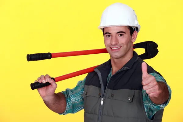 Satisfied workman with thumb up — Stock Photo, Image