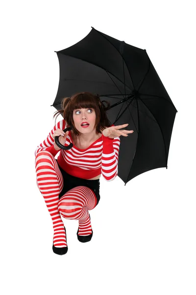 Mulher excêntrica com guarda-chuva — Fotografia de Stock