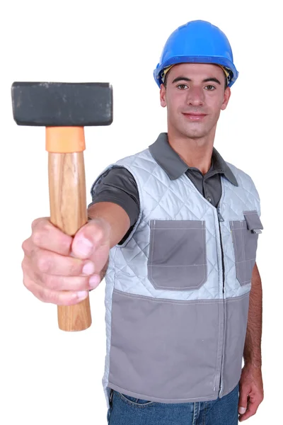 Handyman showing hammer — Stock Photo, Image