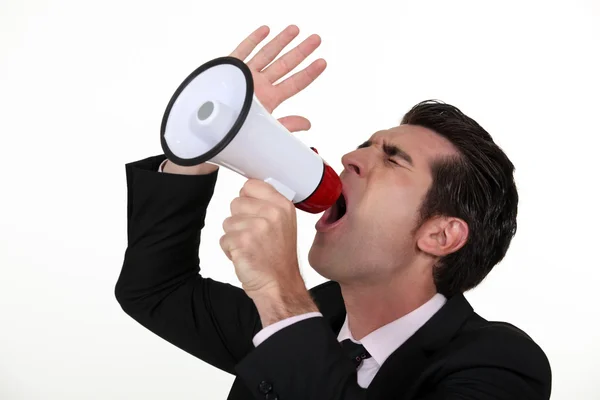 Man shouting through megaphone — Stock Photo, Image