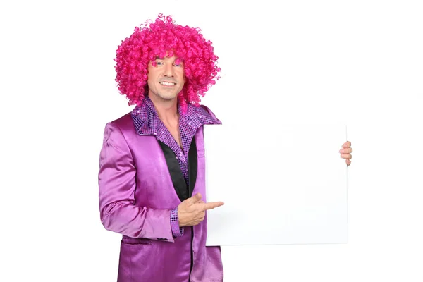 Man in silly seventies costume holding blank board ready for your message Stock Image