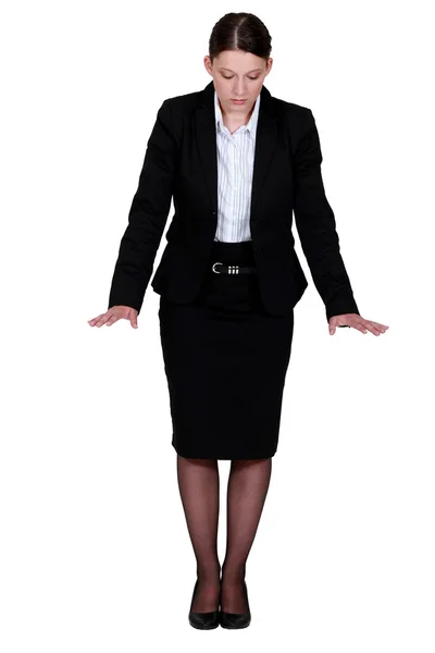 A businesswoman gesturing. Stock Image