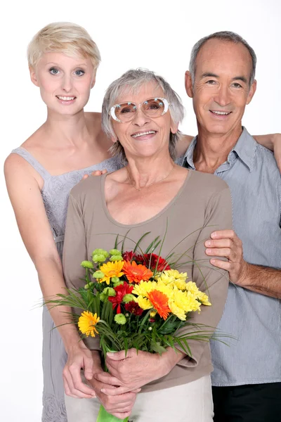 Mother with flowers — Stock Photo, Image