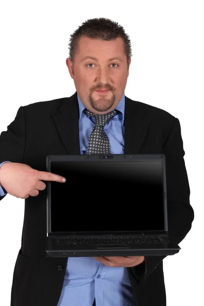 Hombre de mediana edad enseñando informática — Foto de Stock