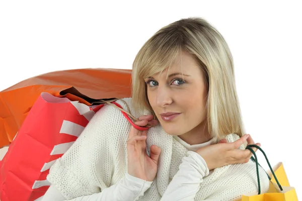 Blonde woman with bags — Stock Photo, Image
