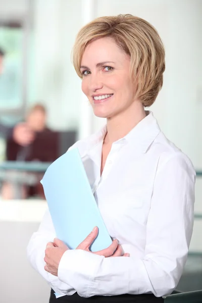 Woman holding a file — Stock Photo, Image