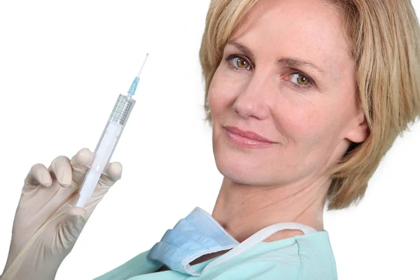 Young practitioner with syringe — Stock Photo, Image