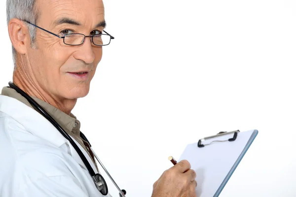 Läkare med skrivskiva — Stockfoto