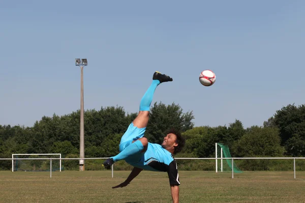 Acrobática de futebol — Fotografia de Stock