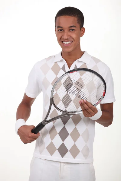 Hombre de pie con raqueta de tenis —  Fotos de Stock