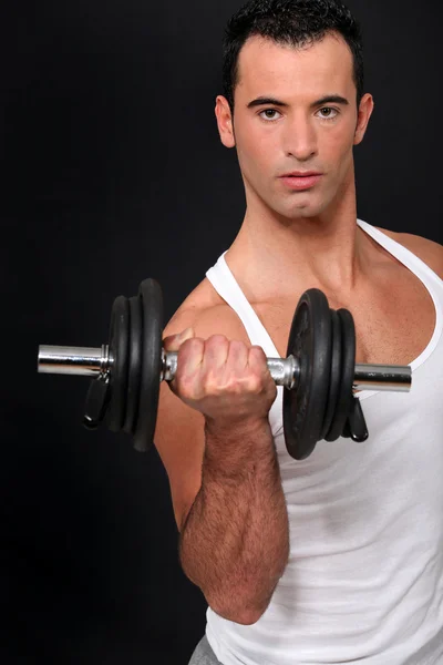 Man lifting dumbbell — Stock Photo, Image