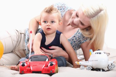 Little boy with radio-controlled car clipart