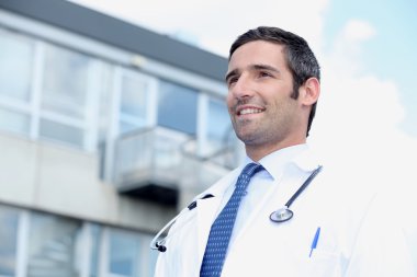 Doctor standing outside clipart