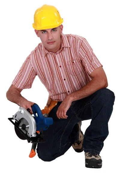 Woodworker with circular saw — Stock Photo, Image