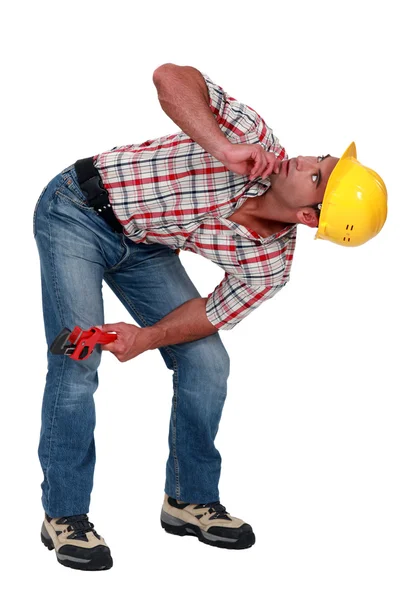 A bended plumber. — Stock Photo, Image