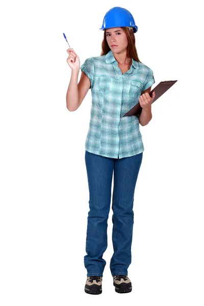 Female inspector holding clipboard — Stock Photo, Image