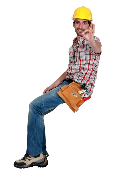 A male construction worker making an ok sign. — Stock Photo, Image