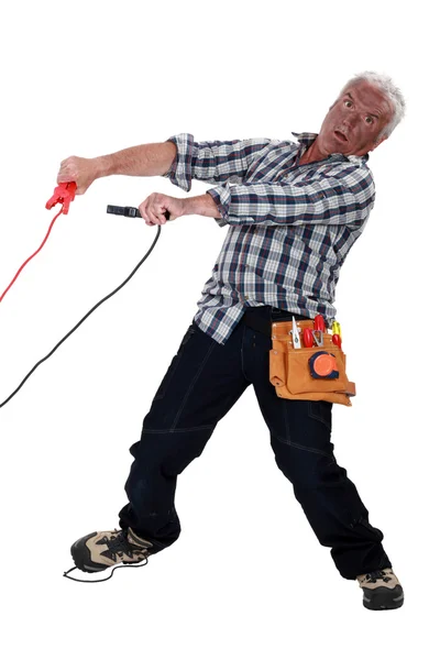 A mature burned electrician. — Stock Photo, Image