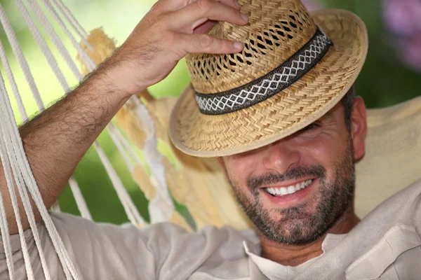 Portrait of a man in a hammock — Stock Photo, Image