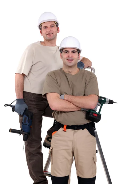 Two men with drills — Stock Photo, Image