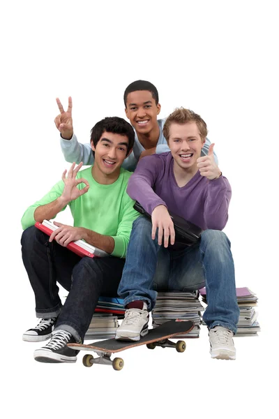 Three teenagers done studying. Royalty Free Stock Photos