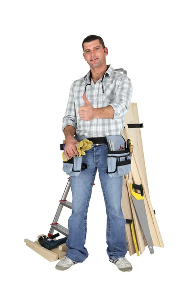 Thumbs up from a carpenter — Stockfoto