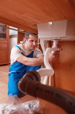 Plumber working clipart