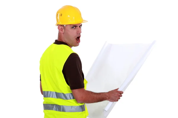 Worker open mouthed in disbelief — Stock Photo, Image