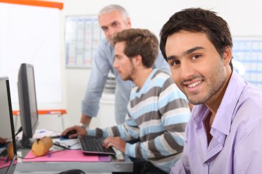 Men in computing training clipart