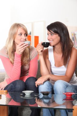 Girls drinking a coffee clipart