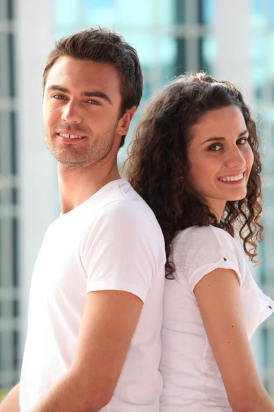 Couple in white t-shirts — Stock Photo, Image
