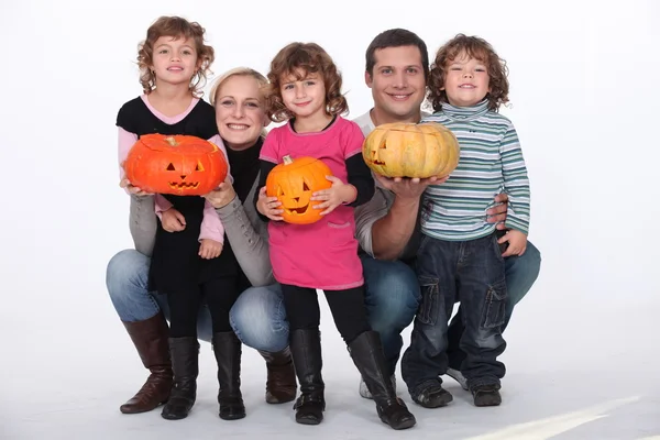 Portrait of kids with pumpkins — Stock Photo, Image