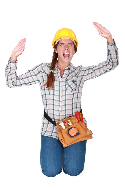 A female manual worker trapped in a box. — Stock Photo, Image