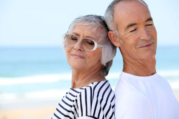 Senior couple on the beach Royalty Free Stock Images