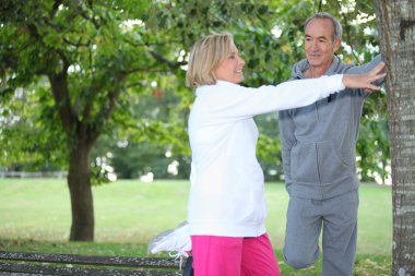 Middle-aged couple jogging clipart